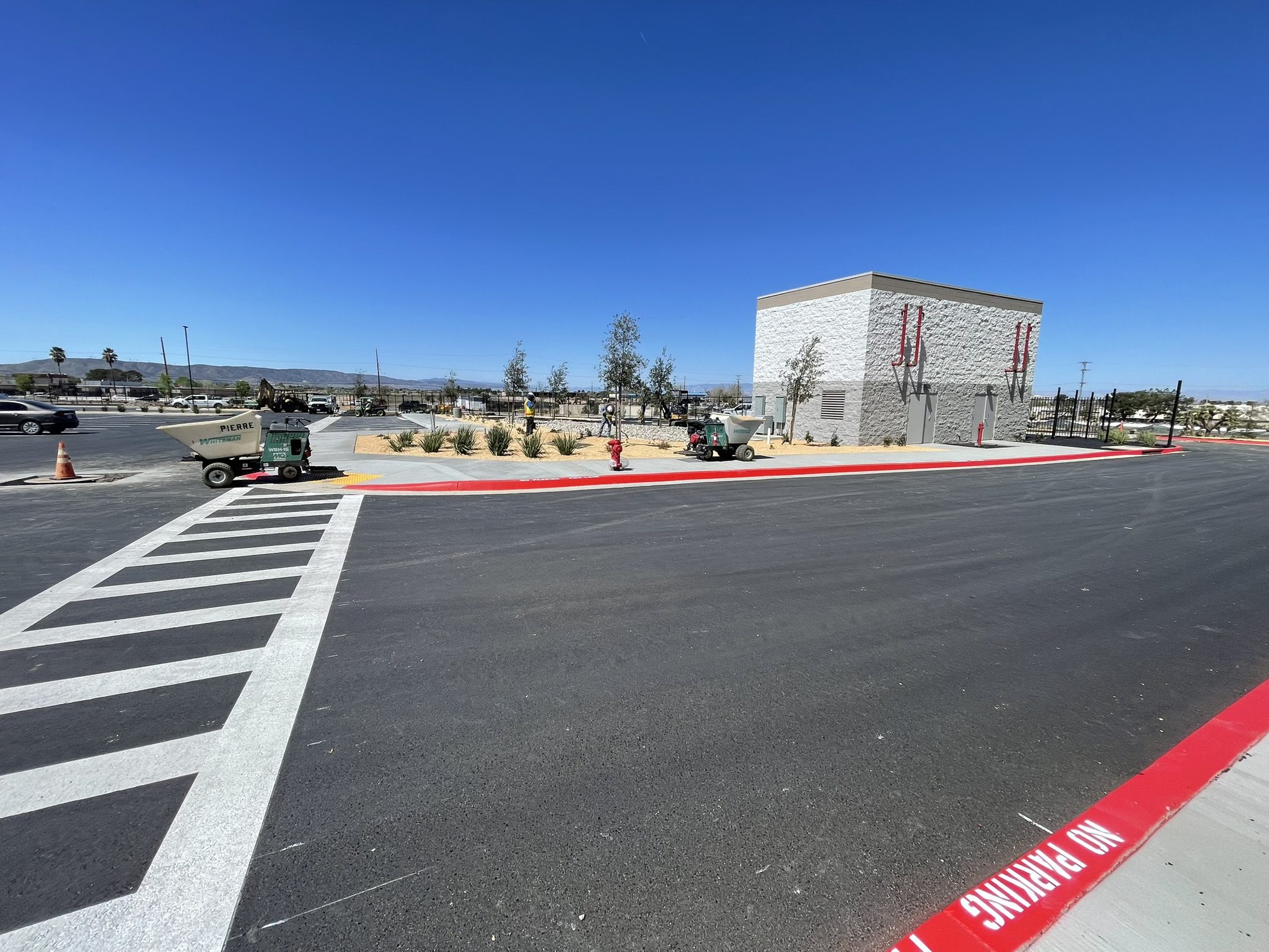 A street with a red line on the side of it.